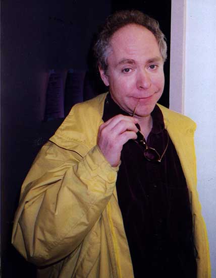 Teller in yellow jacket