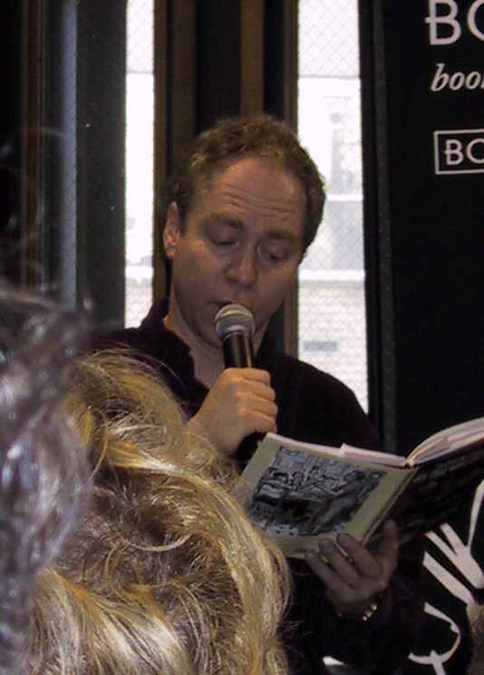 Teller reading from his book