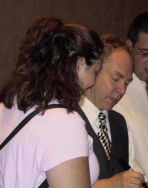 Teller signing autograph